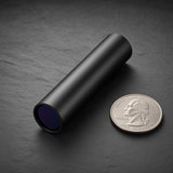 BLACKSITE Compact 365 beside a US quarter for size